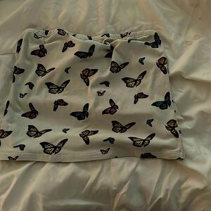Sleeveless white top with black colorful butterflies. XL in size and from rue21